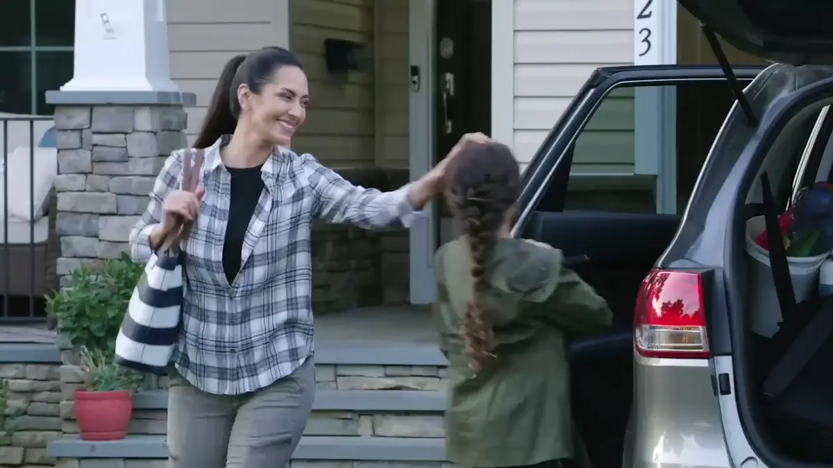 Mother and daughter arriving home